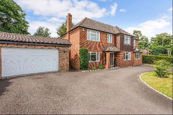 A four bedroom detached house in Englefield Green, situated within a quiet cul-de-sac.