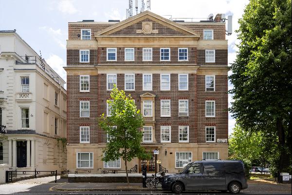 A second floor, four bedroom apartment situated in a grand period building.