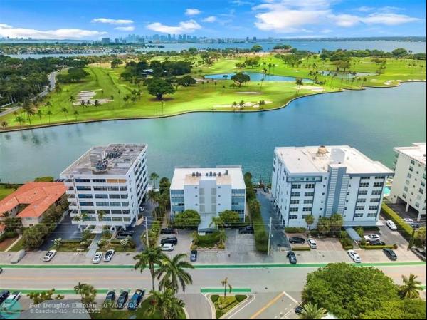 This 2200 sqft 2/2 condo is located in Bay Harbor Island, w/ views of waterfront & the Ind