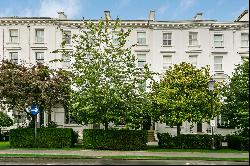 Exquisite six-bedroom family home with striking period details in Kensington.