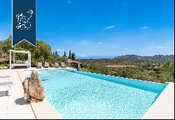 Elegant Mediterranean villa with a n outbuilding and pool near Porto Rotondo