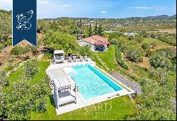 Elegant Mediterranean villa with a n outbuilding and pool near Porto Rotondo