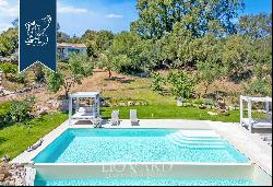 Elegant Mediterranean villa with a n outbuilding and pool near Porto Rotondo