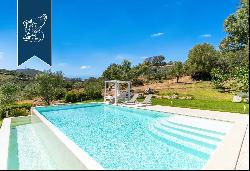 Elegant Mediterranean villa with a n outbuilding and pool near Porto Rotondo