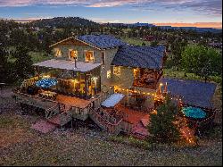 Exceptional 4.25 Acres that is welcoming with its easy terrain and meadow. 