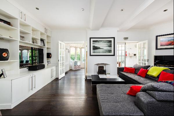 A detached, three bedroom coach house with a private garden on Kidderpore Avenue, NW3.