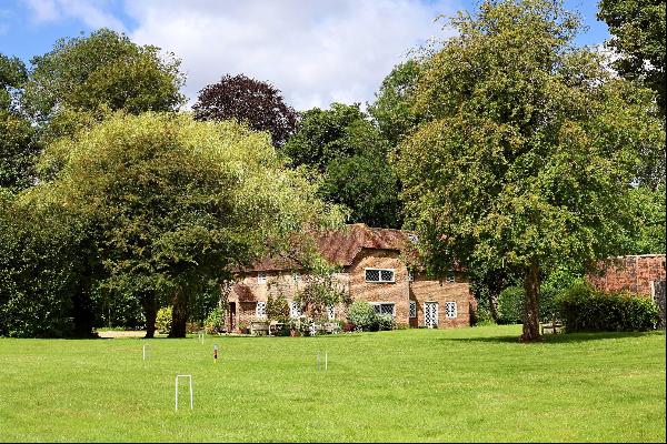 An attractive traditional farmhouse with a detached annexe in a tranquil, picturesque rura