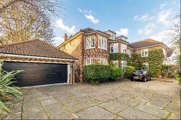 A beautiful, detached family house, beautifully designed and located within Putney Heath a