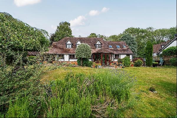 A spacious family home situated in a quiet village location and with great potential.