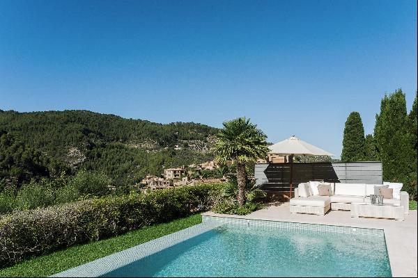 A beautifully renovated property with dramatic mountain views in the charming village of D