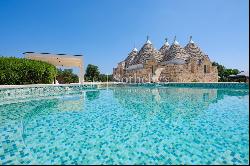 Exclusive trulli compound immersed in nature