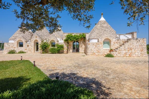 Exclusive trulli compound immersed in nature