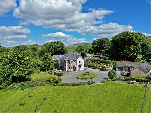 A wonderfully presented home, with excellent outbuildings and over four acres of land with