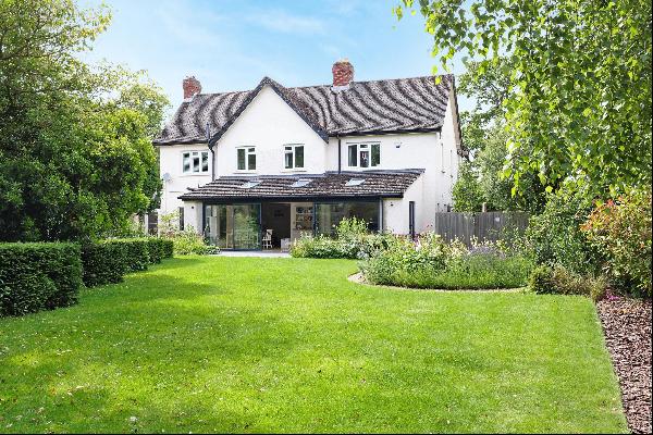 A fabulous family home in the leafy Old Bath Road with five bedrooms and a beautifully lan