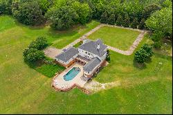 Spectacular Estate Beautifully Sited on 4+/- Private Acres with Lake Views