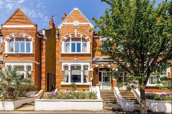 Available to let, a fabulous five-bedroom family house is in a central Wimbledon location.