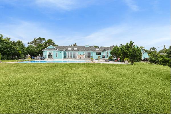 Nestled on the serene shores of Shinnecock Bay, this legal multi-family home offers an unp