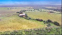 Enchanting Farmhouse on an Expansive 117 Acres 