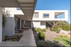 Modern house in Cantagua condominium with sea view.