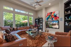 Privately situated on an over-sized lot in guard gated Mira Vista