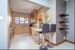 Exceptional corner unit in a secure and private complex in a leafy Fairland