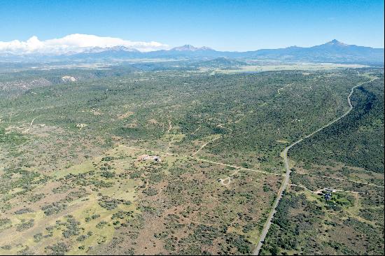 Sweeping Mountain Views On An Expansive and Unique Lot