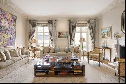 A lavish white Stucco-fronted townhouse in Belgravia.