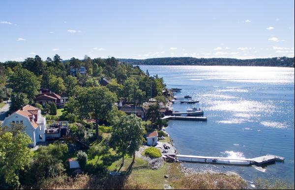 Southwest-facing waterfront property featuring stunning sunsets over the bay