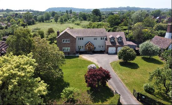 An immaculate modern family home set in a generous south west facing plot with views of op