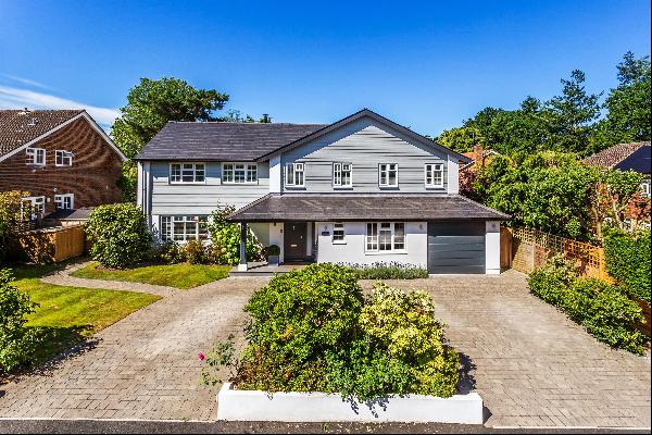 A five bedroom detached house for sale in Cobham.