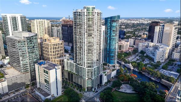 Experience opulent downtown Las Olas living w/ breathtaking skyline views in this sophisti