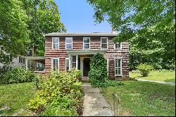 Enchanting 6-bed, 2-bath antique home with 2-story stone barn, nestled in downto