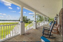 Nantucket Colonial with 100' of water frontage and private dock.