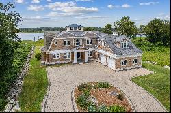 Nantucket Colonial with 100' of water frontage and private dock.