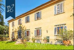 Masterpiece of art and history: historical villa with garens, forest and olive grove surro