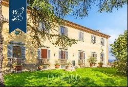 Masterpiece of art and history: historical villa with garens, forest and olive grove surro