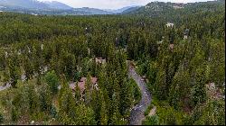 Retreat to a riverfront oasis in this luxurious Breckenridge home. 