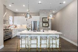  Beautifully designed townhome boasting a two-story great room