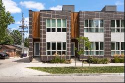  Beautifully designed townhome boasting a two-story great room