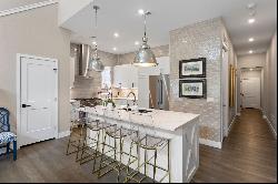  Beautifully designed townhome boasting a two-story great room