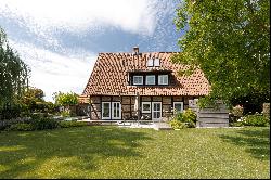 Exclusive half-timbered house with a dream garden in an idyllic location on the