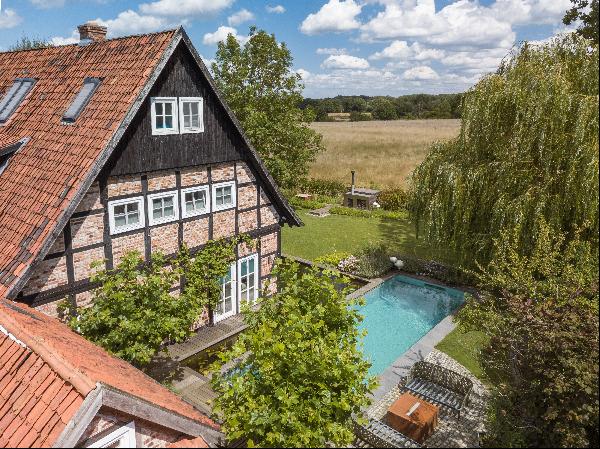 Exclusive half-timbered house with a dream garden in an idyllic location on the