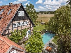 Exclusive half-timbered house with a dream garden in an idyllic location on the