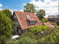 Exclusive half-timbered house with a dream garden in an idyllic location on the