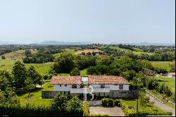 ARBONNE, VAST CONTEMPORARY HOUSE WITH A PANORAMIC VIEW OF THE MOUNTAINS