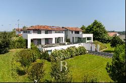 ARBONNE, VAST CONTEMPORARY HOUSE WITH A PANORAMIC VIEW OF THE MOUNTAINS