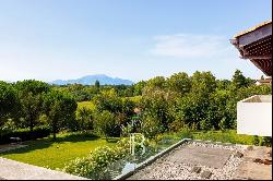 ARBONNE, VAST CONTEMPORARY HOUSE WITH A PANORAMIC VIEW OF THE MOUNTAINS