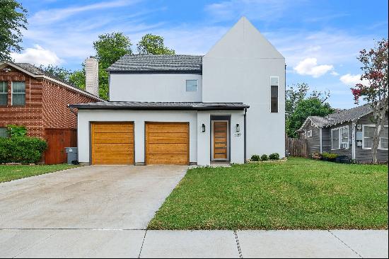 Experience Modern in This Stunning Inwood Village Home