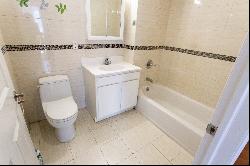 "BRIGHT TWO BEDROOM CONDO IN REGO PARK"