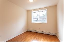 "BRIGHT TWO BEDROOM CONDO IN REGO PARK"